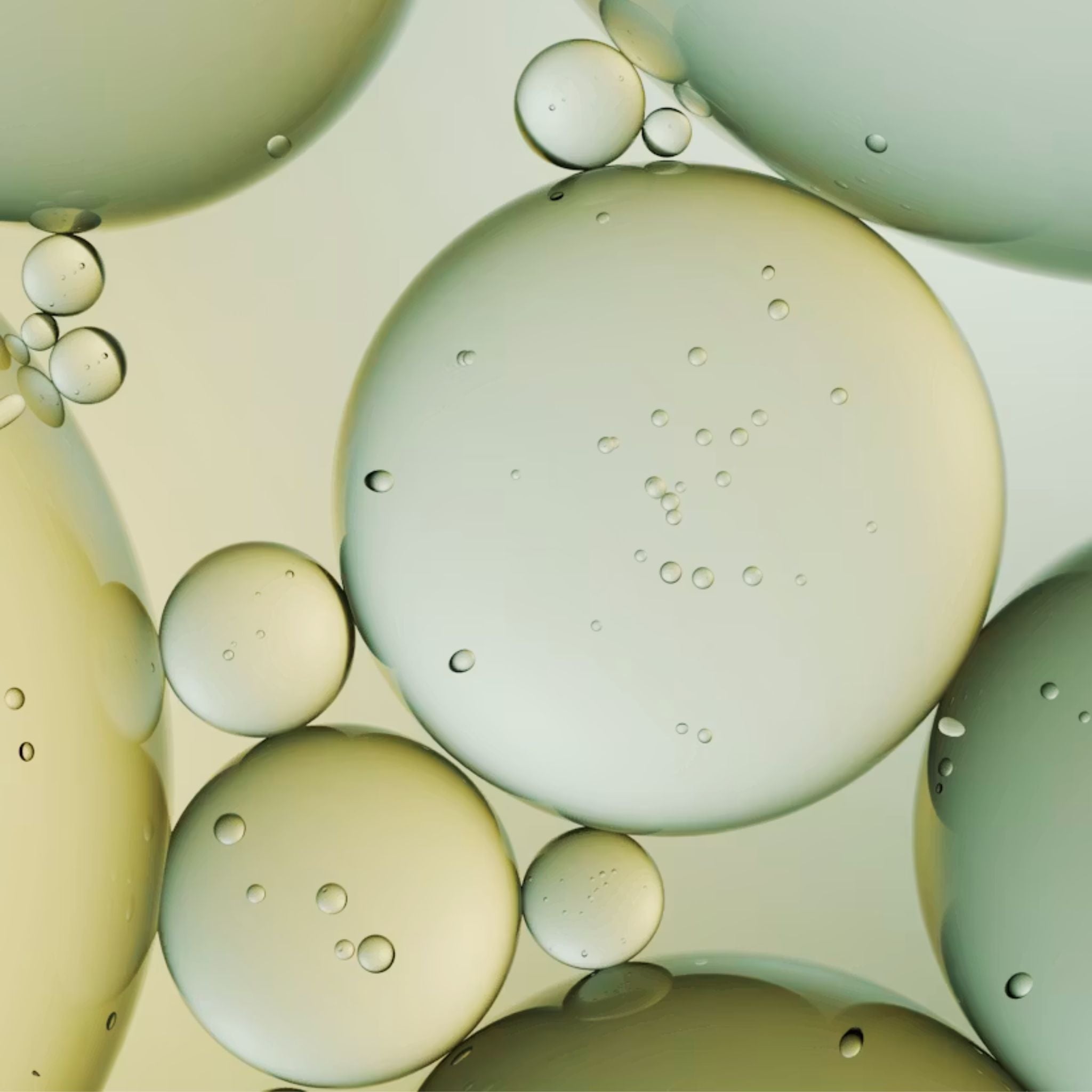 Abstract close-up of translucent liquid in soft pale green, beige, and cream tones against a matching gradient background.