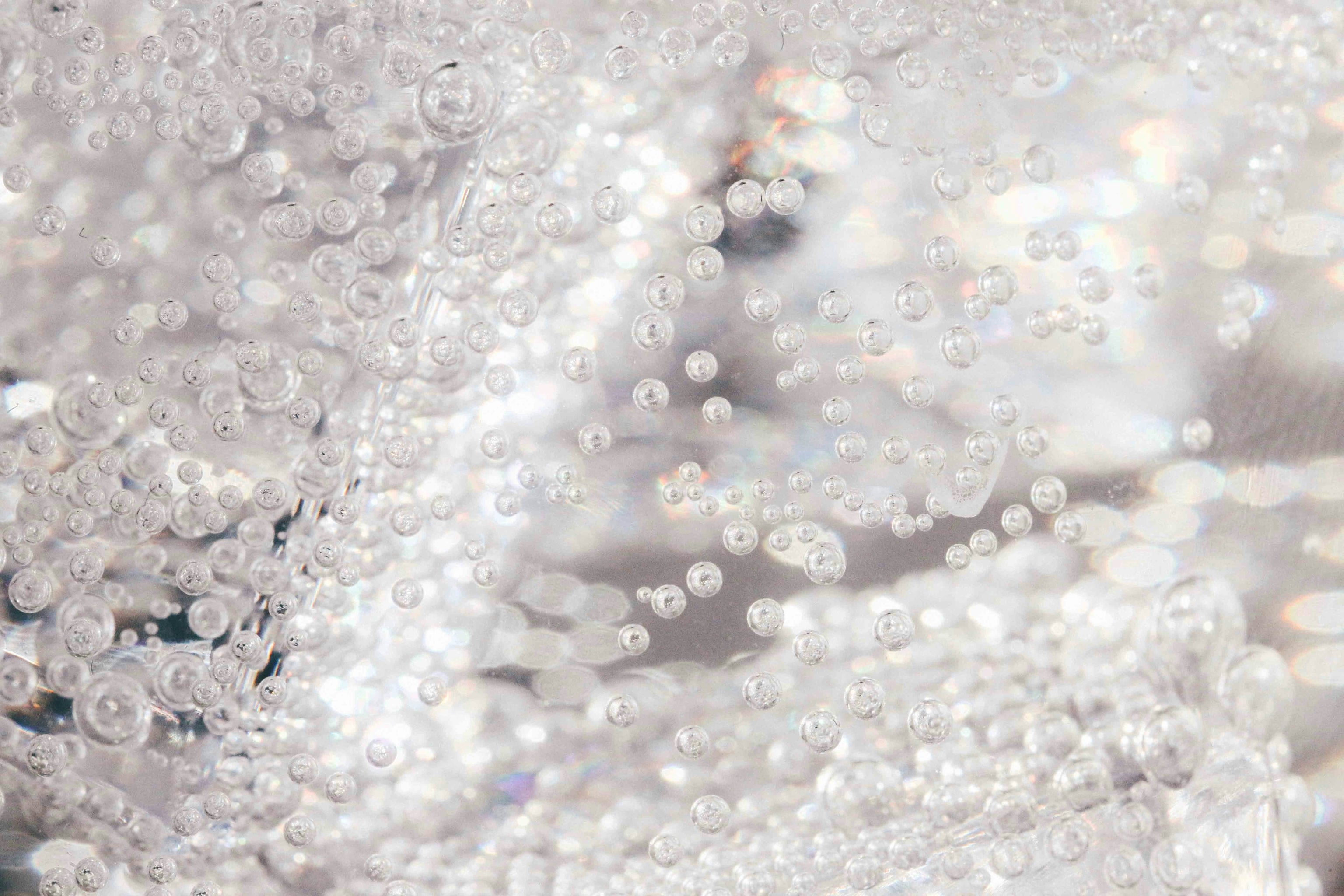 Clear bubbles in water with a blurred background